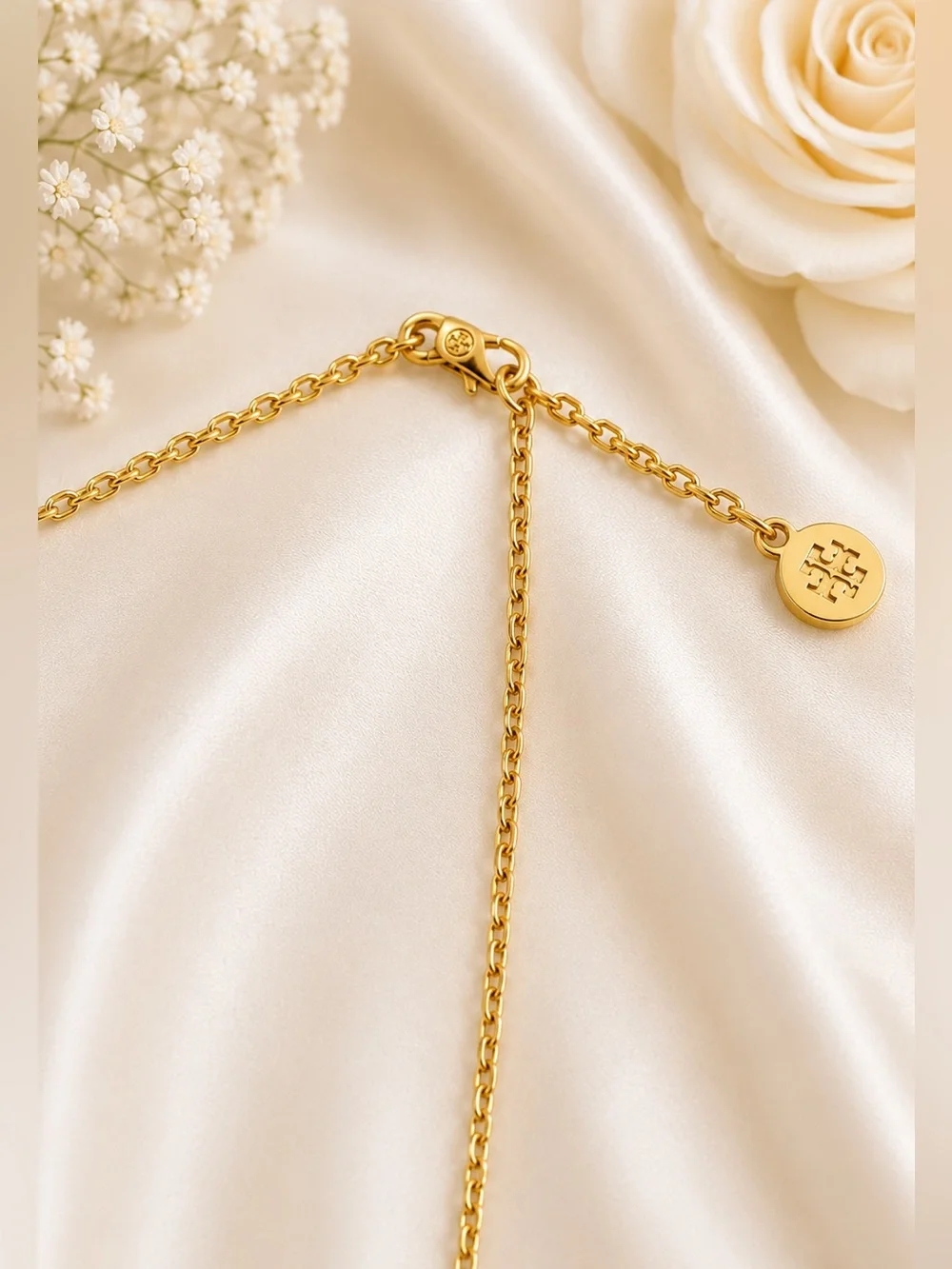 Tory Burch elegant gold
